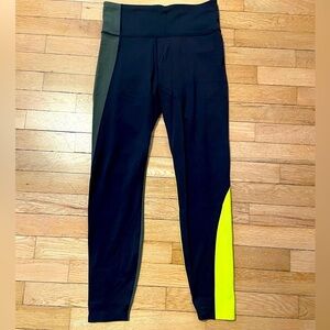 Athleta Black and Neon Yellow Colorblock Asym Leggings Women’s S